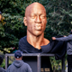 In this Thursday, Sept. 30, 2021, file photo, a sculpture of George Floyd, one of three sculptures as part of the “SEEINJUSTICE” art exhibition that also feature the likenesses of Breonna Taylor and John Lewis, is unveiled as Floyd’s brother Terrence, second from left, looks at Union Square in the Manhattan borough of New York. The statue honoring Floyd was vandalized on Sunday, Oct. 3, police said.